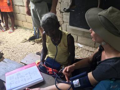 volunteer with aid in haiti