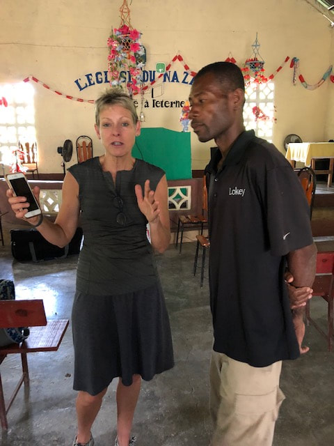 Lisa helping haiti schools with supplies